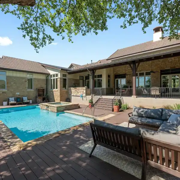 THE EPITOME OF HILL COUNTRY LIVING IN COVETED BELVEDERE