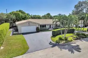 Meticulous Four Bedroom Home in Coral Ridge County Club