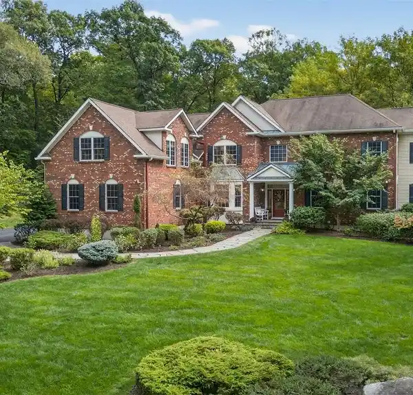 STATELY BRICK COLONIAL IN CHADEAYNE WOODS