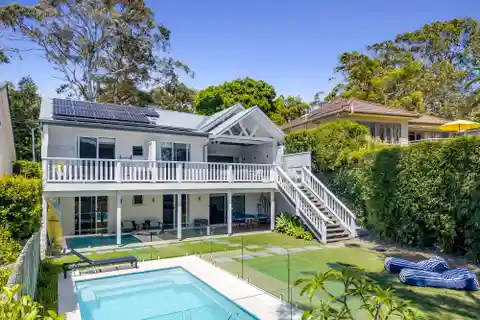 Coastal Retreat with Cathedral Ceilings and Pool