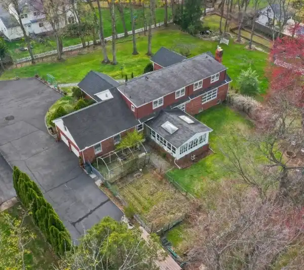 GRACIOUS COLONIAL HOME ON OVER AN ACRE