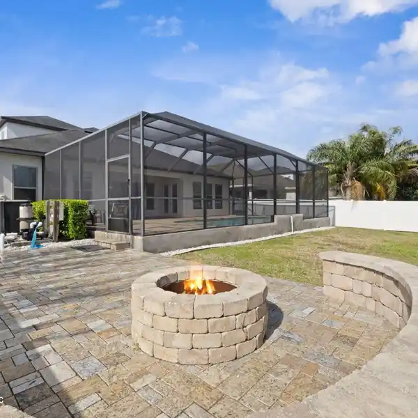 SPACIOUS FIVE BEDROOM HOME WITH RESORT-STYLE BACKYARD