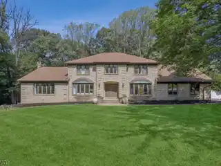 Stunning Residence on a Private Wooded Lot