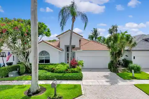 Lakefront Luxury in Prestigious Country Club Community