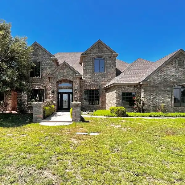 BEAUTIFUL HOME ON FOUR ACRES