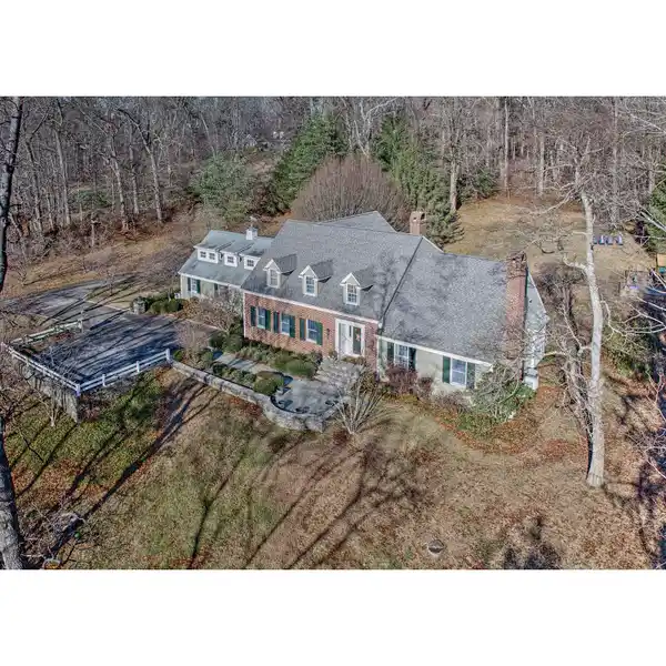 GRACIOUS COLONIAL ON OVER SIX ACRES IN A QUIET CUL-DE-SAC NEIGHBORHOOD