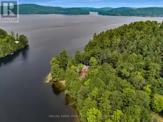 Rare Lakefront Retreat with Dual Deeded Properties