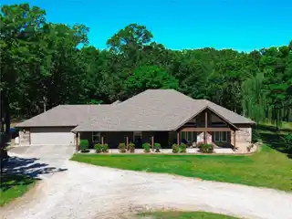 Secluded Acreage Retreat with Massive Workshop