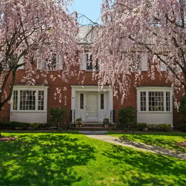 DISTINGUISHED BRICK COLONIAL IN GREENACRES