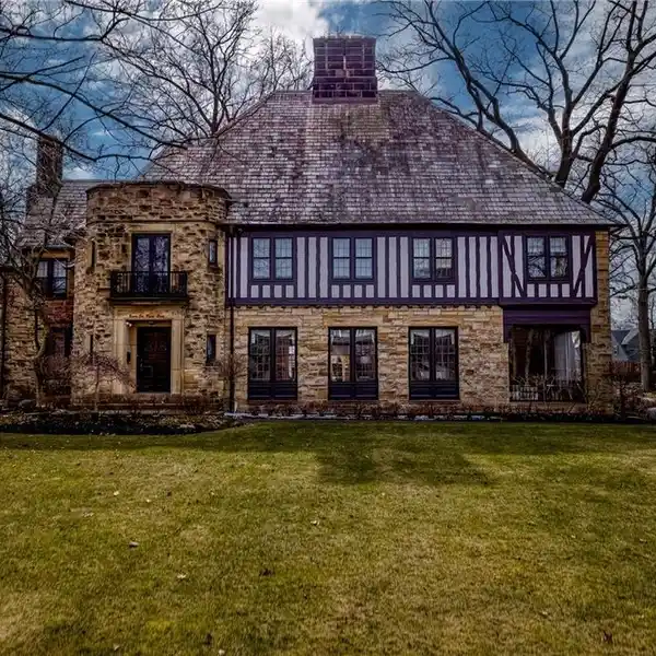 PROMINENT STONE AND BRICK ENGLISH COUNTRY HOME