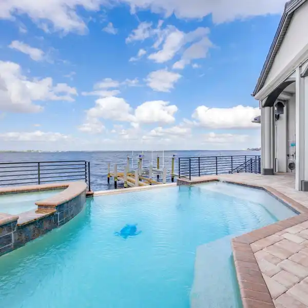 EXQUISITE RIVERFRONT ESTATE IN A GATED COMMUNITY