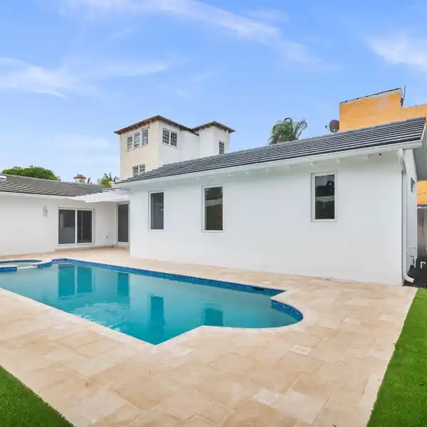 COMPLETELY RENOVATED AND ENLARGED CIRCA 1958 COTTAGE
