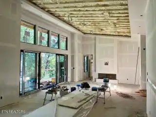 Energy-Efficient Home Backing to Natural Spring