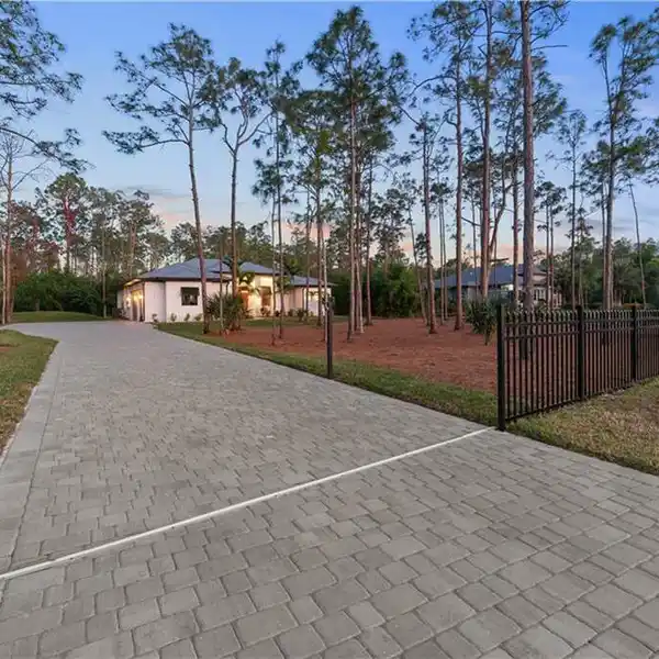 CUSTOM HOME ON A PRIVATE WOODED LOT IN SAN CARLOS ESTATES