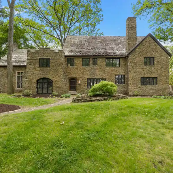 DISTINGUISHED 1925 TUDOR REVIVAL RESIDENCE