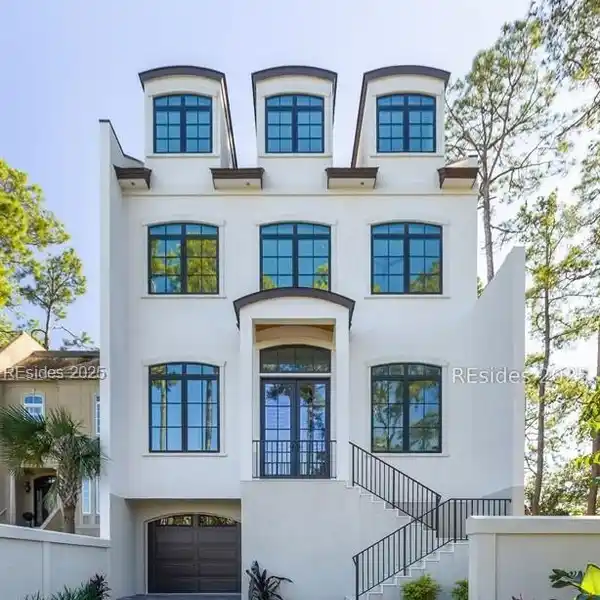 ELEGANT TOWNHOME FEATURING FIVE FLEXIBLE BEDROOMS