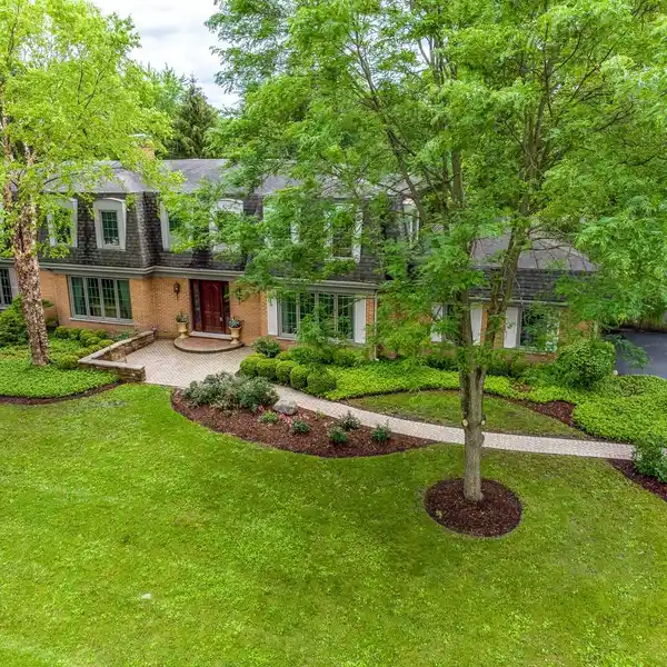 UPDATED LIBERTYVILLE RETREAT ON EXPANSIVE ACRE LOT