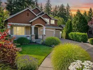 Elegant Home Backing Greenbelt with Luxury Upgrades