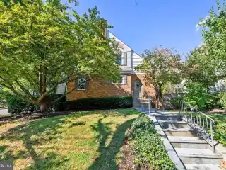 Historic Tudor with Modern Upgrades and Prime Location