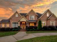 EXQUISITE HOME IN PRESTIGIOUS LAUREL CREEK