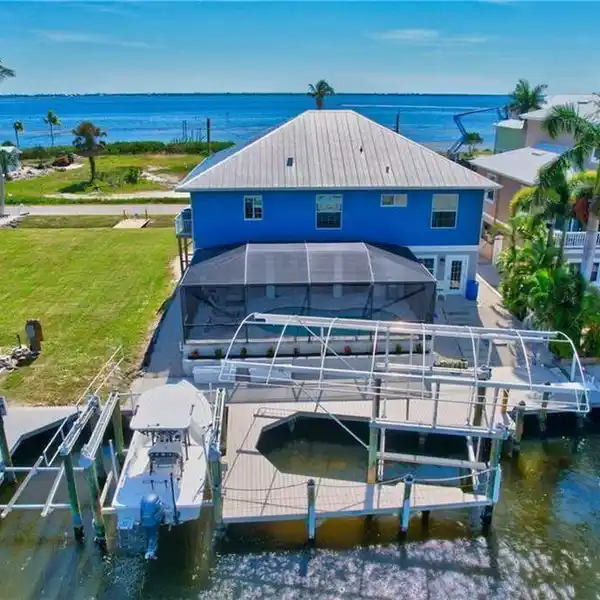 REMARKABLE WATERFRONT GULF ACCESS POOL HOME