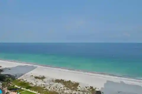 Turnkey Beachfront Condo with Designer Finishes