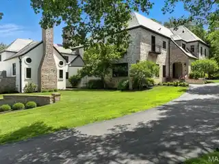 Timeless French Manor on Private 1.17 Acres