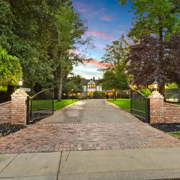 LUXURIOUS TUDOR-STYLE ESTATE ON MANICURED GROUNDS