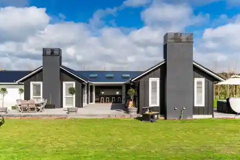 Curated Luxury with Vaulted Indoor-Outdoor Flow