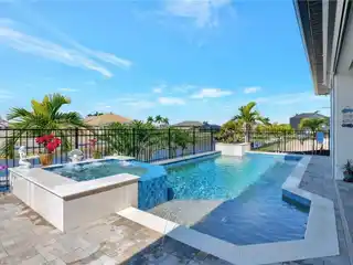 Resort-style Waterfront Gulf Access Pool Home