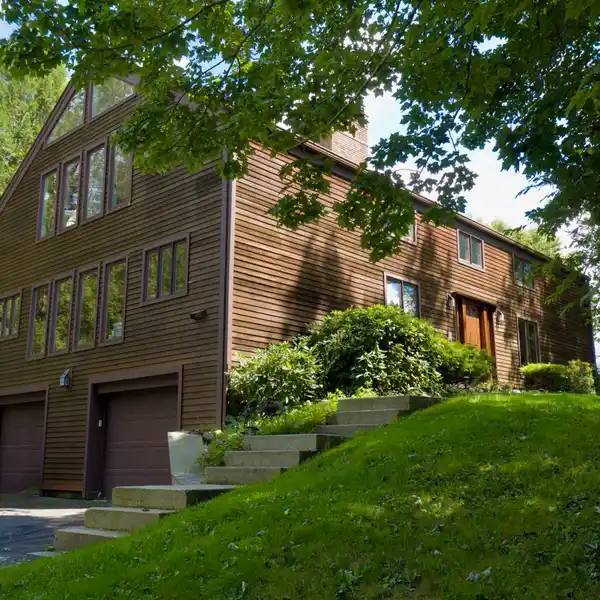 ONE-OF-A-KIND CUSTOM BUILT BARN HOME ON FIVE SECLUDED ACRES