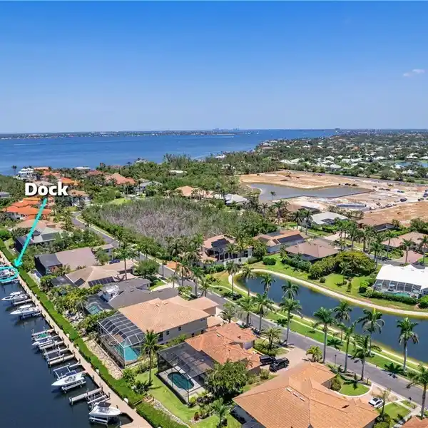 CUSTOM WATERFRONT HOME IN GATED CATALPA COVE