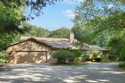 Updated Lakeshore Drive Home with Deck, Pool & Entertainment Spaces