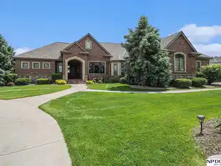 Elegant Lakefront Ranch with Private Sandy Beach