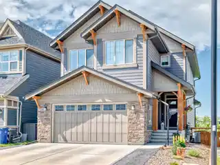 Beautifully Upgraded Home Along the Bow River