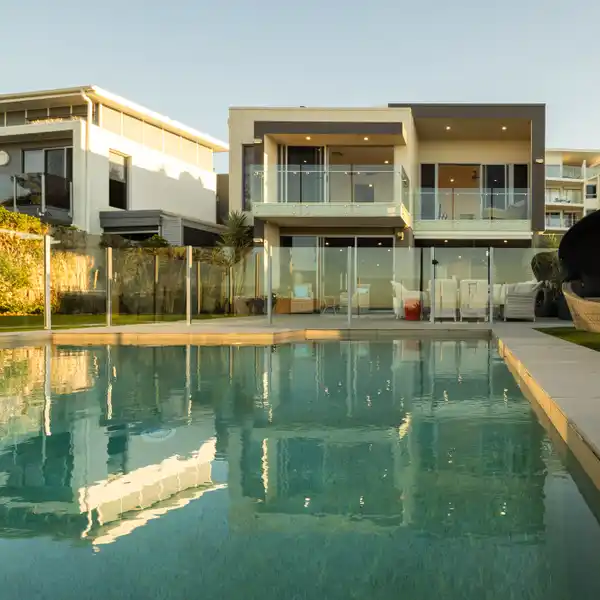 GORGEOUS BEACHFRONT TRI-LEVEL HOME
