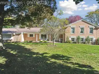 Beautifully Maintained Pond-front Home