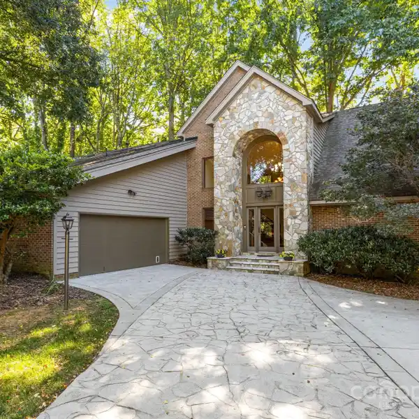 PRIVATE WATERFRONT RETREAT WITH TIMELESS LAKEFRONT CHARM