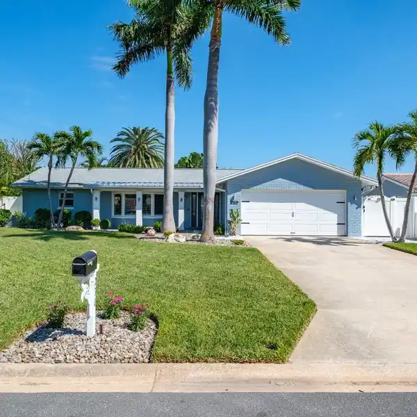 CUSTOM QUARTZ KITCHEN WITH CYPRESS BEAM ACCENTS