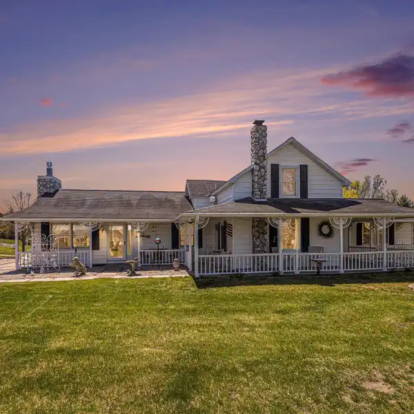 SPRAWLING COUNTRY ESTATE WITH POND, POLE BARN & OUTDOOR AMENITIES