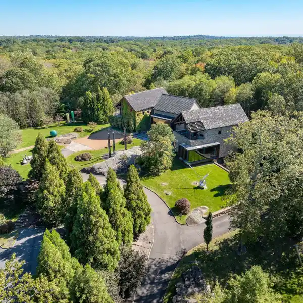 ONE-OF-A-KIND STONE AND GLASS RESIDENCE
