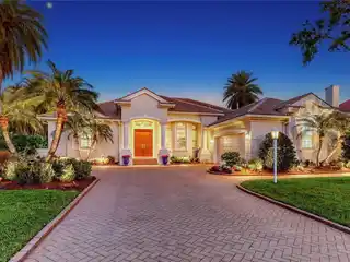 Exquisite Lakefront Home in Award-winning University Park Country Club