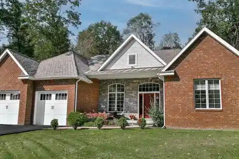 Custom Brick Beauty with Backyard Vacation Oasis