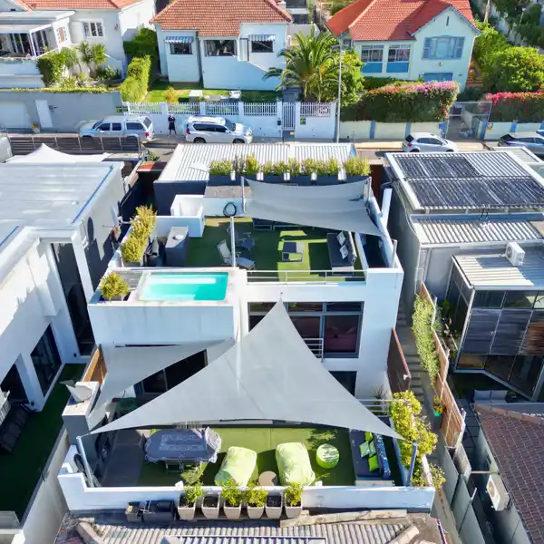 DESIGNER RETREAT WITH ROOFTOP POOL AND SEA VIEWS