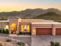 GORGEOUS CUSTOM HOME ON OVER THREE ACRES IN A GATED ENCLAVE