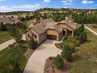 LOW-MAINTENANCE LUXURY LIVING IN A COVETED GATED COMMUNITY