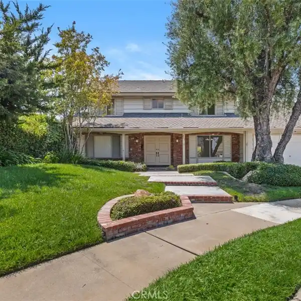 LOVINGLY MAINTAINED HOME AWAITING NEW OWNER'S TOUCH