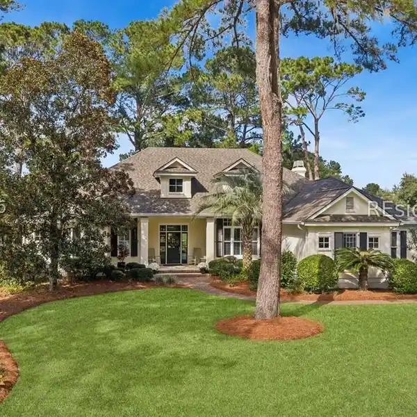 EXQUISITE GOLF & LAGOON VIEWS FROM THIS 4BR/4.5BA BELFAIR RESIDENCE