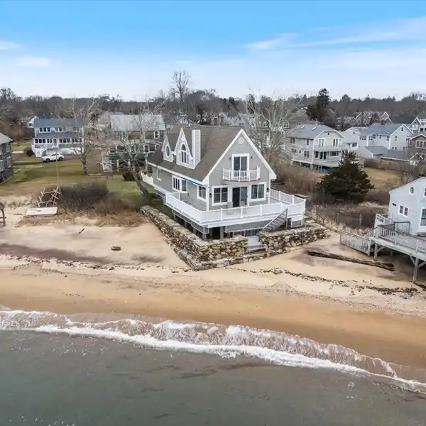 COASTAL RETREAT STEPS FROM THE SAND