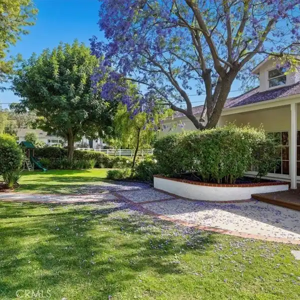 CHARMING LIGHT-FILLED HOME IN A SOUGHT-AFTER NEIGHBORHOOD